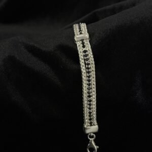 Pulsera tejida con zirconia de plata .925